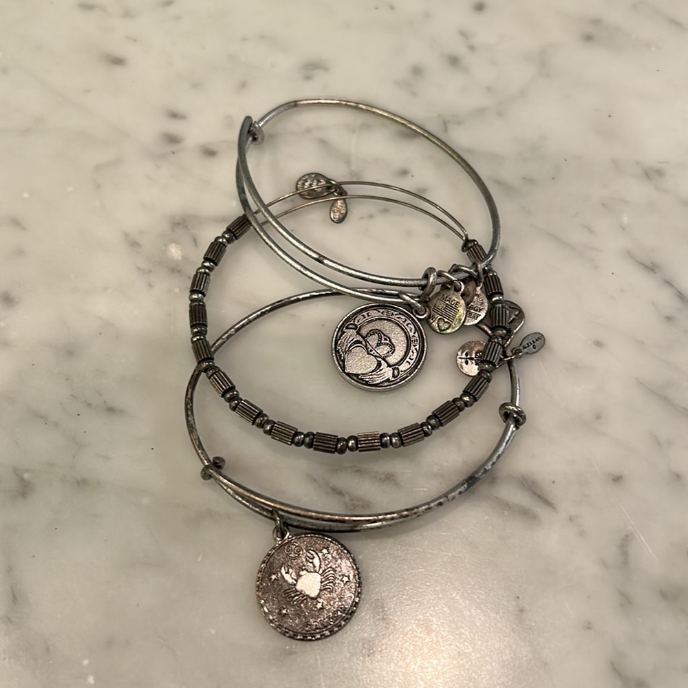 Stack Of Alex And Ani Bangles - image 1